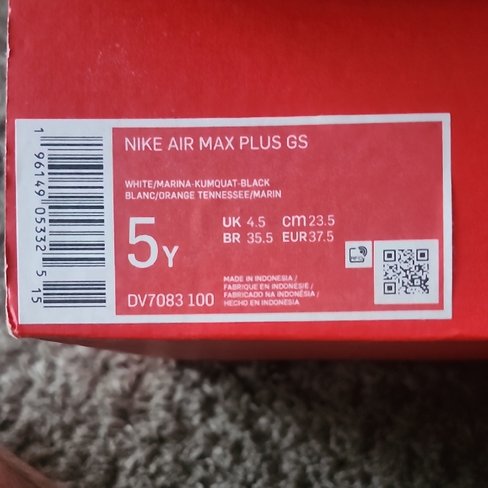 Nike Air Max Plus GS in White, Orange, and Black
